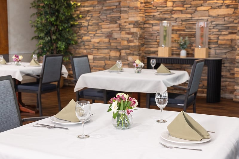 Dining room tables with dishes set